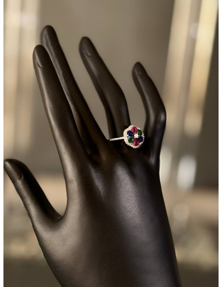 Women's ring studded with precious stones